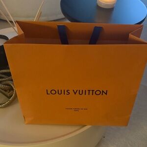 Louis Vuitton Bold Orange Bag with Blue Handles